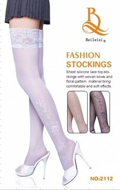 Чулки с кружевной резинкой. Состав: 100% нейлон. Цвет: белый.