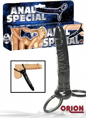Анальный стимулятор черного цвета. Крепится гибкими колечками к пенису и яичкам.